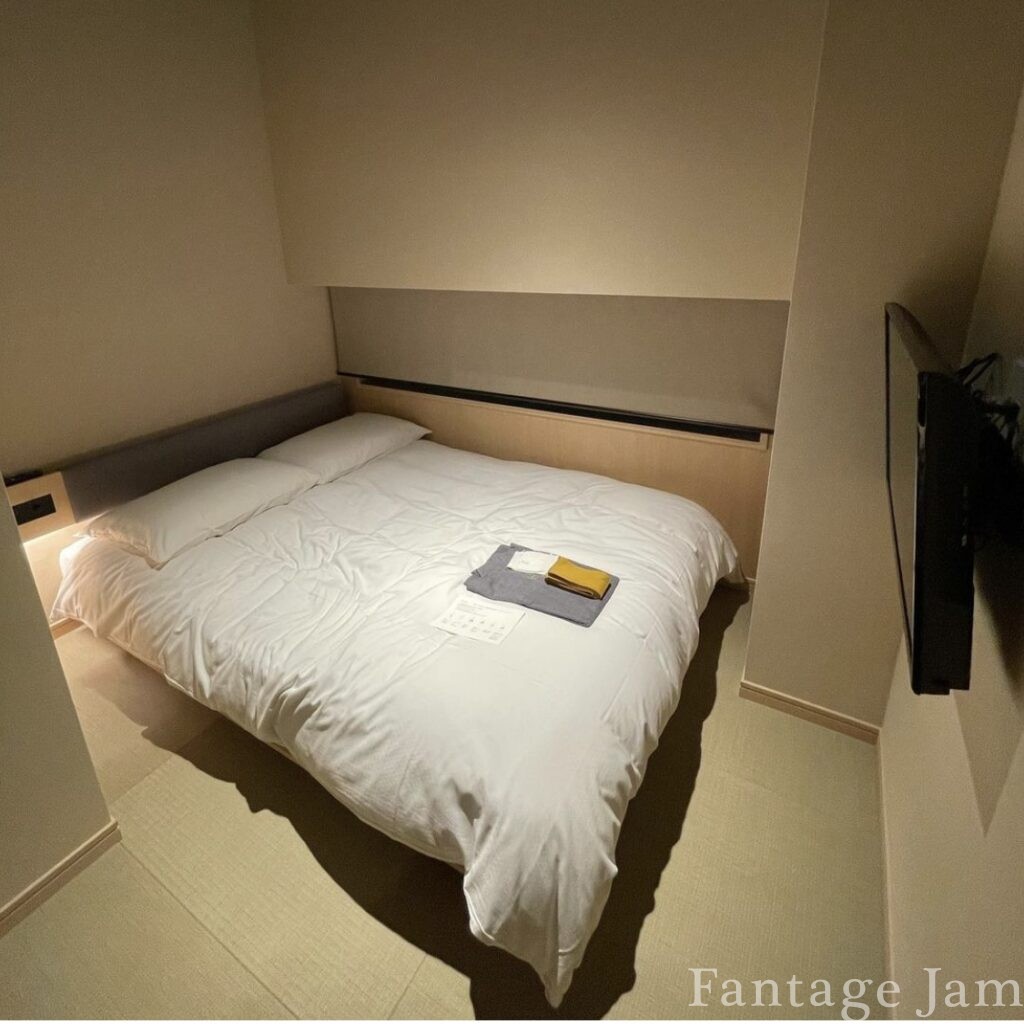 ONSEN RYOKAN 由縁 新宿の部屋とベッドの写真