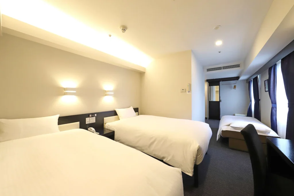 新横浜国際ホテルの客室写真、ベッド